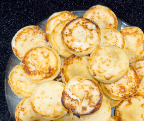 Poster - Pancakes on a counter in a market