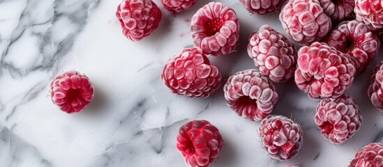 Wall Mural - Indulge in the Irresistible Freeze-Dried Raspberries on a Luxurious Marble Counter