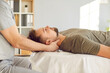 © Studio Romantic - Head and neck massage, manual therapy rehabilitation, physical therapist doing manipulative therapy. Male medical session to relieve tension, reduce headache, increase relaxation and body health