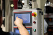© gen_A - operator working with touchscreen control panel