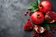 Tasty fresh red pomegranate on a dark concrete background. Environmentally friendly fruits and vegetables 