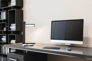 Wall Mural - Close up of simple designer office interior with creative wooden bookcase, empty computer monitor and other items. Mock up, 3D Rendering.