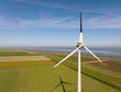 © Westend61 - Experimental wind turbine with one blade painted black to reduce collisions with birds