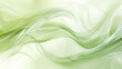 Abstract background, waves of a thin veil of pale green color smoothly flow and intertwine