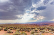 scenic desert landscape near Page in Arizona with dark clouds in background, bad weather approaches