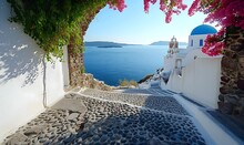 An Arched Gateway Offering A Glimpse Of The Sea, Embodying The Quintessential Beach Living Of Santorini Island Style