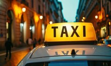 Picture Of A Taxi Sign On A Car Roof. Taxi Transport Detail Against Night Blur City.