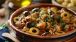 © Jennifer - Spanish dish Callos a la Madrilena, typical stew with beef tripe, serving with olives