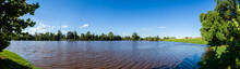 Brown Floodwaters Covering Park Playing Field After River Broke Banks