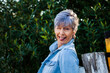 © Austockphoto - Middle aged woman winking and pulling fun faces