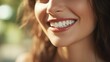 © Suwanlee - A close up photo of the lower part of a woman face beautiful cute smile with very clean perfect teeth.