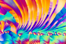 A Dynamic, High-resolution Image Of Salicylic Acid Crystals Under A Microscope, Exhibiting A Kaleidoscope Of Colors In A Fan-like Pattern