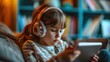 Child wearing headphones, deeply focused on a tablet for remote learning, close-up on their concentration