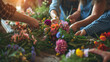 © Helen-HD - Floral background, with female hands on blurred background of various flowers. Floral workshop with participants. A company of women creates traditional Slavic bouquets.