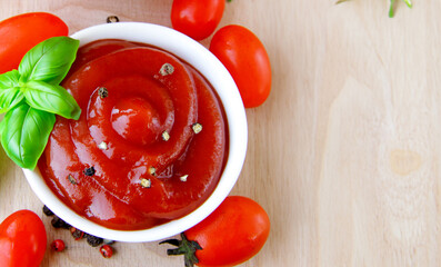 Wall Mural - tomato sauce ketchup in a bowl on the table