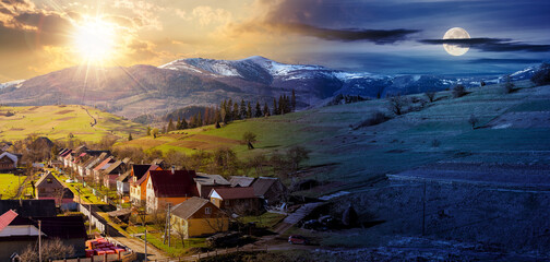 Wall Mural - carpathian rural landscape in springtime. ukrainian village in the valley. arable on the alpine hill