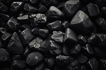 Poster - A black and white photo capturing a pile of rocks. Can be used to depict nature, balance, or construction
