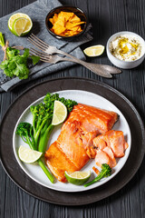 Canvas Print - hot smoked salmon with cooked broccoli and lime