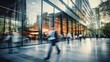 © FoxTok - Blurred business background. Walking businessmen in a modern glass office center, shopping mall, bank. Movement effect, stylish interior with green plants