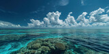 Fototapeta  - Great Barrier Reef on the coast of Queensland, Australia seascape. Coral sea marine ecosystem wallpaper with blue cloudy sky in the daylight