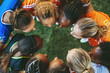 © Lucy Welch - Diverse Women's Sport's Team in Huddle