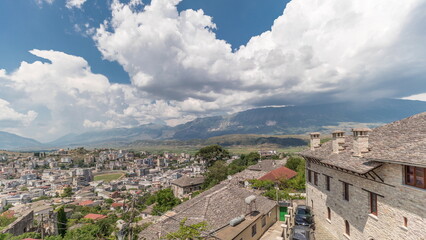 Sticker - Panorama showing Gjirokastra city from the viewpoint with many typical historic houses of Gjirokaster timelapse.