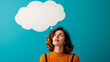 © henjon - Woman with thought bubble on blue background, concept of ideas and creativity. Copy space.