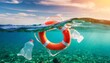 ocean plastic pollution concept with plastic waist and lifebuoy floating in the ocean or sea