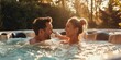 Couple (man and woman) relaxing in a hot tub for romantic spa day