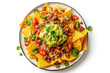 Mexican nachos with beef, guacamole, cheese sauce, peppers, tomato and onion in plate isolated on white background. Top view