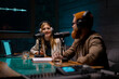 © Big Shot Theory - Joyful young stylish radio show hosts record fresh podcast episode in loft studio