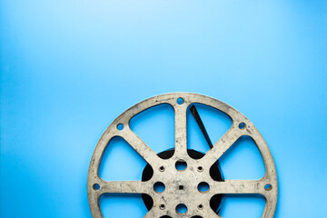 Wall Mural - Cinema industry and movie background with film reels, top view