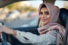 Portrait Of A Beautiful Muslim Young Woman In A Hijab,driving A Car And Smiling,anti-discrimination Concept,success And Independence Of Muslim Women,cultural Diversity