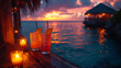 View from a beautiful oceanfront hut at sunset with candles and tropical cocktails, tiki bar, tiki hut, island vacation escape, desert island, pink, blue, purple, orange, ocean, beach, palm trees