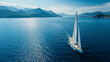 © Letyi - Luxurious sailing yacht in the blue sea against the backdrop of mountains