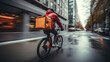 Fast delivery rider cycling in urban environment, blurred motion, with a large orange insulated backpack.