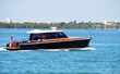 Upscale vintage cabin cruiser on the Florida Intra-Coastal Waterway off of Miami Beach.