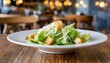 Close up of fresh caesar salad with lettuce, croutons, parmesan cheese