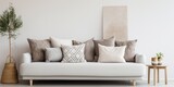 Fototapeta  - Patterned pillows on a beige settee in a stylish Scandinavian living room.