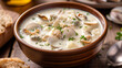 clam chowder soup with clams, cream and parsley