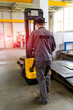 © Vadim - Worker operates the forklift in the warehouse