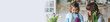 © ArtSys - Happy mother and daughter doing home gardening together in the kitchen, taking care about flowers, plants. Family traditions, quality time, fun, enjoy domestic life. Mother's or Women's day. Banner