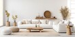© Lasvu - Spacious white living room with furniture, decor, and natural elements.