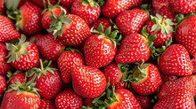  A Close Up Of A Pile Of Strawberries With The Words Strawberries Written On The Bottom Of The Picture And A Close Up Of A Pile Of Strawberries On The Bottom Of Strawberries.