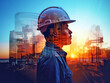 Engineer in a hard hat with city and sunset background