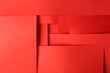 Closeup view of red paper sheets as background
