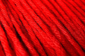Wall Mural - Closeup view of red wool yarn threads as background