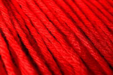 Poster - Closeup view of red wool yarn threads as background