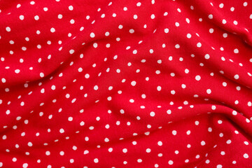 Wall Mural - Closeup view of red polka dot fabric texture as background