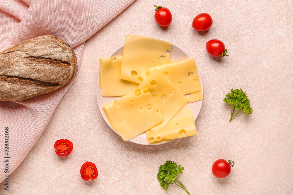 Plate with tasty cheese slices, bread, tomatoes and parsley on beige background